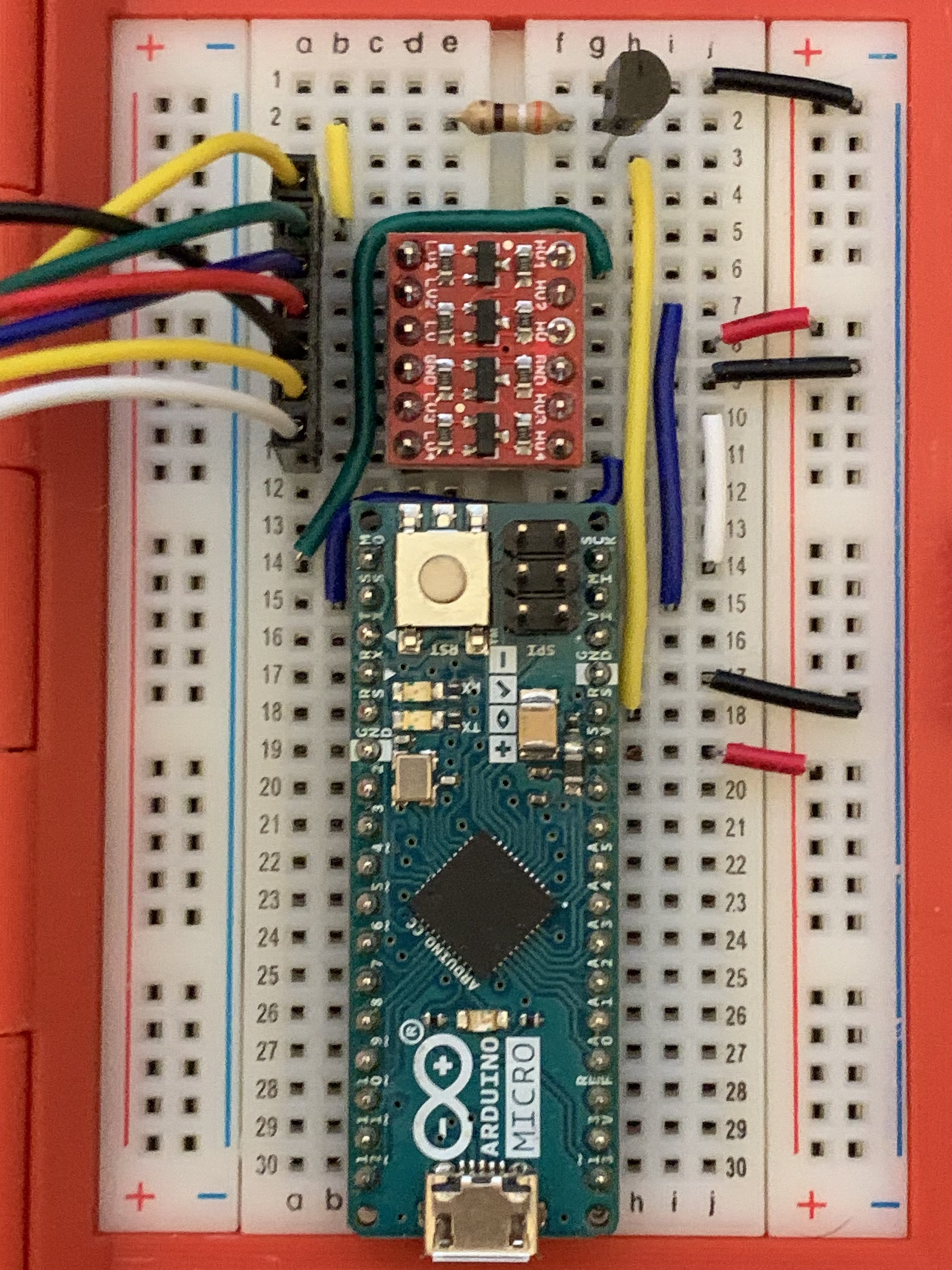 Arduino on a breadboard fully wired to the Pi.